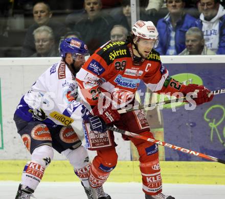 EBEL. Eishockey Bundesliga. KAC gegen VSV. Christoph Brandner, (KAC),  Gerhard Unterluggauer (VSV). Klagenfurt, am 20.3.2011.
Foto: Kuess 

---
pressefotos, pressefotografie, kuess, qs, qspictures, sport, bild, bilder, bilddatenbank