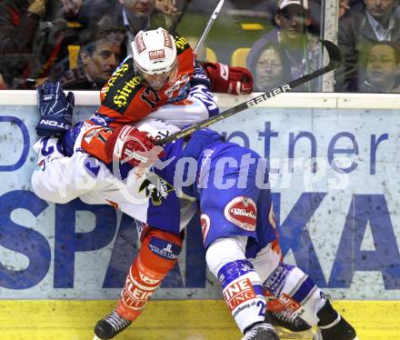 EBEL. Eishockey Bundesliga. KAC gegen VSV. Gregor Hager, (KAC), Greg Kuznik (VSV). Klagenfurt, am 24.3.2011.
Foto: Kuess 

---
pressefotos, pressefotografie, kuess, qs, qspictures, sport, bild, bilder, bilddatenbank