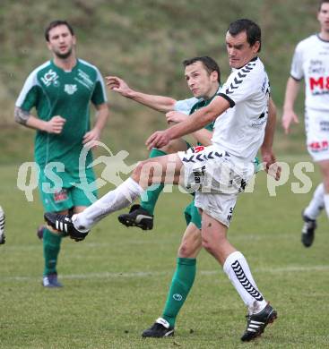 Fussball Regionalliga. Feldkirchen SV gegen DSV Leoben. Robert Micheu (Feldkirchen), Roland Rinnhofer (Leoben). Klagenfurt, am 26.3.2011.
Foto: Kuess
---
pressefotos, pressefotografie, kuess, qs, qspictures, sport, bild, bilder, bilddatenbank