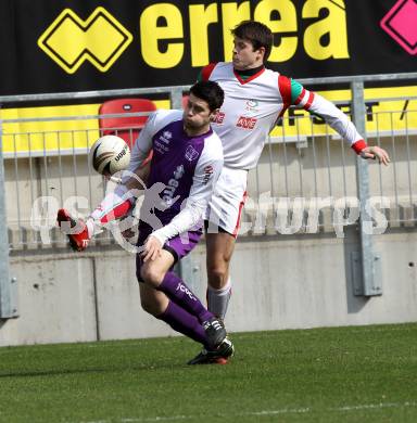 Fussball. Regionalliga. SK Austria Klagenfurt gegen FC Wels.  Stephan Buergler, (Klagenfurt), Tobias Michael Madl (Wels). Klagenfurt, 27.3.2011.
Foto: Kuess

---
pressefotos, pressefotografie, kuess, qs, qspictures, sport, bild, bilder, bilddatenbank