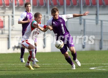 Fussball. Regionalliga. SK Austria Klagenfurt gegen FC Wels. Peter Pucker, (Klagenfurt), Kai Fazeny  (Wels). Klagenfurt, 27.3.2011.
Foto: Kuess

---
pressefotos, pressefotografie, kuess, qs, qspictures, sport, bild, bilder, bilddatenbank