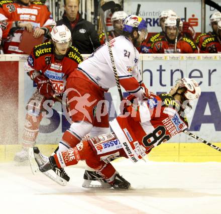 EBEL. Eishockey Bundesliga. KAC gegen Red Bull Salzburg. Raphael Herburger, (KAC), Shaun Heshka (Salzburg). Klagenfurt, am 5.4.2011.
Foto: Kuess 

---
pressefotos, pressefotografie, kuess, qs, qspictures, sport, bild, bilder, bilddatenbank