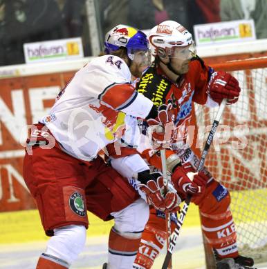 EBEL. Eishockey Bundesliga. KAC gegen Red Bull Salzburg. Kirk Furey, (KAC),  Douglas Lynch (Salzburg). Klagenfurt, am 5.4.2011.
Foto: Kuess 

---
pressefotos, pressefotografie, kuess, qs, qspictures, sport, bild, bilder, bilddatenbank