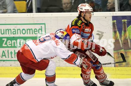 EBEL. Eishockey Bundesliga. KAC gegen Red Bull Salzburg. Thomas Hundertpfund, (KAC), Thomas Koch (Salzburg). Klagenfurt, am 5.4.2011.
Foto: Kuess 

---
pressefotos, pressefotografie, kuess, qs, qspictures, sport, bild, bilder, bilddatenbank