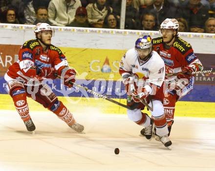 EBEL. Eishockey Bundesliga. KAC gegen Red Bull Salzburg. Stephan Geier, Manuel Geier,  (KAC), Dominique Heinrich  (Salzburg). Klagenfurt, am 5.4.2011.
Foto: Kuess 

---
pressefotos, pressefotografie, kuess, qs, qspictures, sport, bild, bilder, bilddatenbank