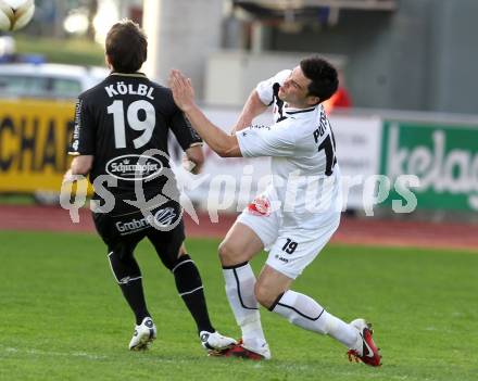 Fussball Erste Liga. WAC/St. Andrae gegen TSV Hartberg. Putsche Roland (WAC), Koelbl Michael (Hartberg). Wolfsberg, 8.4.2011
Foto: Kuess

---
pressefotos, pressefotografie, kuess, qs, qspictures, sport, bild, bilder, bilddatenbank