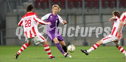 Fussball. Regionalliga. SK Austria Klagenfurt gegen GAK. Johannes Isopp,  (Klagenfurt), Roland Kollmann (GAK). Klagenfurt, 8.4.2011.
Foto: Kuess

---
pressefotos, pressefotografie, kuess, qs, qspictures, sport, bild, bilder, bilddatenbank