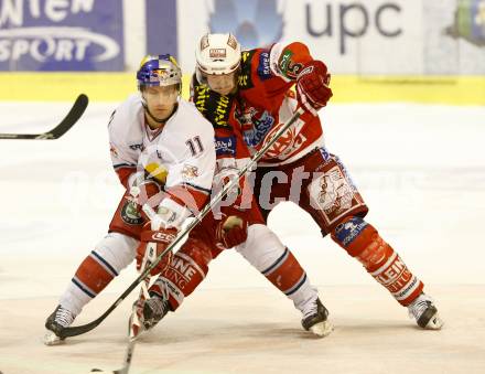 EBEL. Eishockey Bundesliga. KAC gegen Red Bull Salzburg. Paul Schellander, (KAC), Martin St. Pierre (Salzburg). Klagenfurt, am 10.4.2011.
Foto: Kuess 

---
pressefotos, pressefotografie, kuess, qs, qspictures, sport, bild, bilder, bilddatenbank