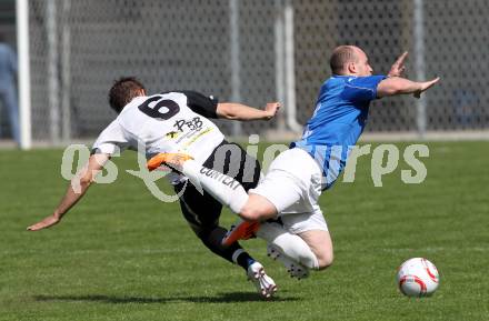 Fussball Kaerntner Liga. Welzenegg gegen St. Veit. Stefan Dollinger(Welzenegg), Daniel Barrazutti (St. Veit). Welzenegg, am 10.4.2011.
Foto: Kuess
---
pressefotos, pressefotografie, kuess, qs, qspictures, sport, bild, bilder, bilddatenbank