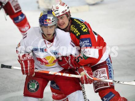 EBEL. Eishockey Bundesliga. Red Bull Salzburg gegen KAC. Martin St.  Pierre (Salzburg), David Schuller,  (KAC). Salzburg, am 12.4.2011.
Foto: Kuess 

---
pressefotos, pressefotografie, kuess, qs, qspictures, sport, bild, bilder, bilddatenbank