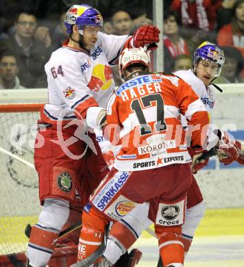 EBEL. Eishockey Bundesliga. KAC gegen Red Bull Salzburg. Gregor Hager,  (KAC), Andre Lakos (Salzburg). Klagenfurt, am 14.4.2011.
Foto: Kuess 

---
pressefotos, pressefotografie, kuess, qs, qspictures, sport, bild, bilder, bilddatenbank