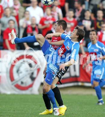 Fussball. Regionalliga. Feldkirchen SV gegen GAK. Sebestyen Balazs (Feldkirchen), Hofer Michael (GAK). Klagenfurt, 22.4.2011.
Foto: Kuess

---
pressefotos, pressefotografie, kuess, qs, qspictures, sport, bild, bilder, bilddatenbank