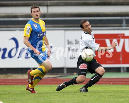 Fussball Erste Liga. WAC/St. Andrae gegen Vienna. Reich Marco (WAC), Osoinik Patrick (Vienna). Wolfsberg, 29.4.2011
Foto: Kuess

---
pressefotos, pressefotografie, kuess, qs, qspictures, sport, bild, bilder, bilddatenbank