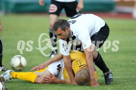 Fussball Erste Liga. WAC/St. Andrae gegen Cashpoint SCR Altach. Marco Reich,  (WAC), Philipp Netzer (Altach). Wolfsberg, 17.5.2011
Foto: Kuess

---
pressefotos, pressefotografie, kuess, qs, qspictures, sport, bild, bilder, bilddatenbank