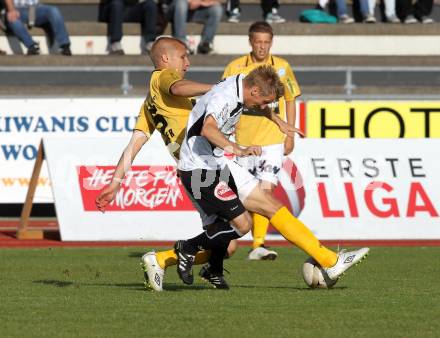 Fussball Erste Liga. WAC/St. Andrae gegen Cashpoint SCR Altach. Manuel Kerhe,  (WAC), Philipp Netzer (Altach). Wolfsberg, 17.5.2011
Foto: Kuess

---
pressefotos, pressefotografie, kuess, qs, qspictures, sport, bild, bilder, bilddatenbank