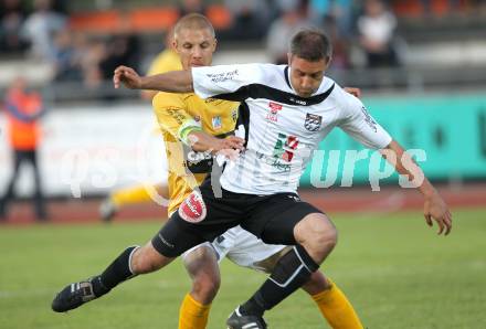 Fussball Erste Liga. WAC/St. Andrae gegen Cashpoint SCR Altach.  Marco Reich, (WAC), Philipp Netzer (Altach). Wolfsberg, 17.5.2011
Foto: Kuess

---
pressefotos, pressefotografie, kuess, qs, qspictures, sport, bild, bilder, bilddatenbank