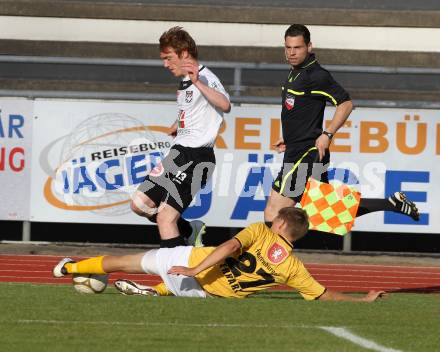 Fussball Erste Liga. WAC/St. Andrae gegen Cashpoint SCR Altach.  Matthias Berchtold,  (WAC), Julian Erhart (Altach). Wolfsberg, 17.5.2011
Foto: Kuess

---
pressefotos, pressefotografie, kuess, qs, qspictures, sport, bild, bilder, bilddatenbank