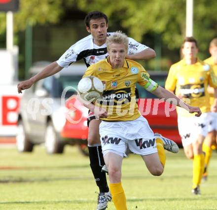 Fussball Erste Liga. WAC/St. Andrae gegen Cashpoint SCR Altach. Nenad Jovanovic, (WAC),  Matthias Koch (Altach). Wolfsberg, 17.5.2011
Foto: Kuess

---
pressefotos, pressefotografie, kuess, qs, qspictures, sport, bild, bilder, bilddatenbank