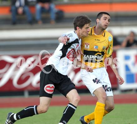 Fussball Erste Liga. WAC/St. Andrae gegen Cashpoint SCR Altach.  Christian Falk (WAC), Jimenez Cabrera Ione Agoney (Altach). Wolfsberg, 17.5.2011
Foto: Kuess

---
pressefotos, pressefotografie, kuess, qs, qspictures, sport, bild, bilder, bilddatenbank