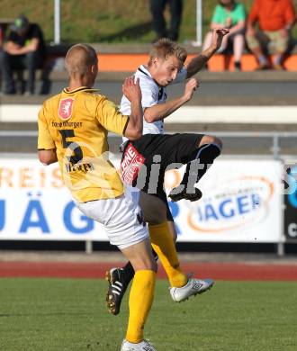 Fussball Erste Liga. WAC/St. Andrae gegen Cashpoint SCR Altach. Manuel Kerhe,  (WAC), Philipp Netzer (Altach). Wolfsberg, 17.5.2011
Foto: Kuess

---
pressefotos, pressefotografie, kuess, qs, qspictures, sport, bild, bilder, bilddatenbank