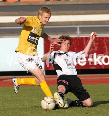 Fussball Bundesliga. Erste Liga. WAC/St. Andrae gegen Cashpoint SCR Altach. Mathias Berchtold (WAC), Matthias Koch (Altach). Wolfsberg, am 17.5.2011.
Foto: Kuess
---
pressefotos, pressefotografie, kuess, qs, qspictures, sport, bild, bilder, bilddatenbank