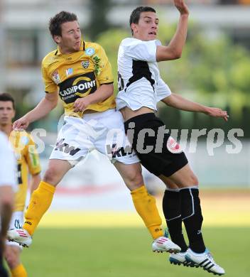 Fussball Bundesliga. Erste Liga. WAC/St. Andrae gegen Cashpoint SCR Altach. Sandro Gotal (WAC), Daniel Schuetz (Altach). Wolfsberg, am 17.5.2011.
Foto: Kuess
---
pressefotos, pressefotografie, kuess, qs, qspictures, sport, bild, bilder, bilddatenbank