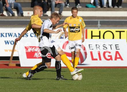 Fussball Bundesliga. Erste Liga. WAC/St. Andrae gegen Cashpoint SCR Altach. Manuel Kerhe (WAC), Philipp Netzer (Altach). Wolfsberg, am 17.5.2011.
Foto: Kuess
---
pressefotos, pressefotografie, kuess, qs, qspictures, sport, bild, bilder, bilddatenbank