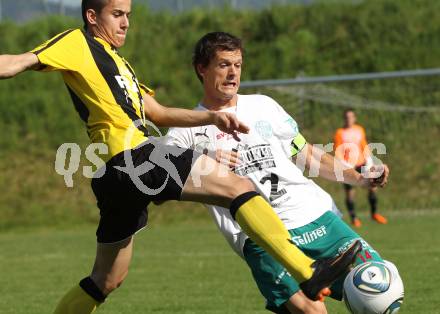 Fussball Kaerntner Liga. Griffen gegen Lendorf. Christian Stanic (Griffen), Christian Huber (Lendorf). Griffen, am 14.5.2011.
Foto: Kuess
---
pressefotos, pressefotografie, kuess, qs, qspictures, sport, bild, bilder, bilddatenbank