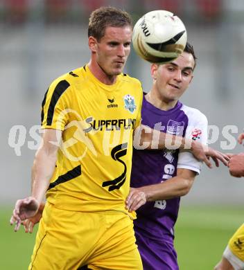 Fussball Regionalliga. SK Austria Klagenfurt gegen Pasching. Alexander Percher (Austria), Peter Orosz (Pasching). Klagenfurt, am 20.5.2011.
Foto: Kuess
---
pressefotos, pressefotografie, kuess, qs, qspictures, sport, bild, bilder, bilddatenbank