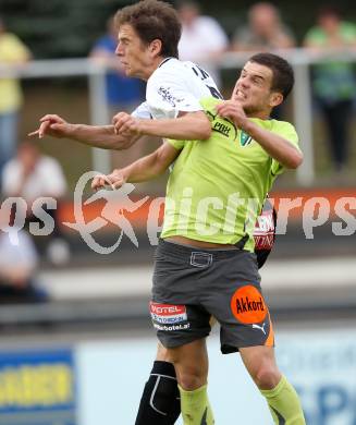 Fussball Erste Liga. WAC/St. Andrae gegen FC Gratkorn. Christian Falk,  (WAC), Thomas Zuendel (Gratkorn). Wolfsberg, 24.5.2011
Foto: Kuess

---
pressefotos, pressefotografie, kuess, qs, qspictures, sport, bild, bilder, bilddatenbank