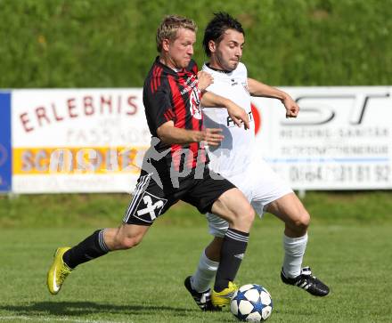 Fussball Unterliga Ost. Ruden gegen ATUS Ferlach. Juergen Slamanig (Ruden), Juergen Kozel (Ferlach). Ruden, am 6.5.2011.
Foto: Kuess
---
pressefotos, pressefotografie, kuess, qs, qspictures, sport, bild, bilder, bilddatenbank