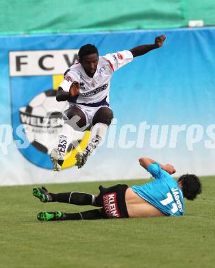 Fussball Testspiel. WAC/ St. AndrÃ¤ gegen SAK. Jacobo (WAC), Makanda Christian Mpaka (SAK). Klagenfurt, am 1.7.2011.
Foto: Kuess
---
pressefotos, pressefotografie, kuess, qs, qspictures, sport, bild, bilder, bilddatenbank