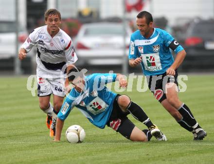 Fussball Testspiel. WAC/ St. AndrÃ¤ gegen SAK. Roland Putsche, Hannes Jochum (WAC), Grega Triplat (SAK). Klagenfurt, am 1.7.2011.
Foto: Kuess
---
pressefotos, pressefotografie, kuess, qs, qspictures, sport, bild, bilder, bilddatenbank