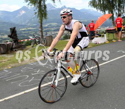 Ironman Austria.  Radfahren. Christian Troger (AUT).. KLagenfurt, am 3.7.2011.
Foto: Kuess

---
pressefotos, pressefotografie, kuess, qs, qspictures, sport, bild, bilder, bilddatenbank