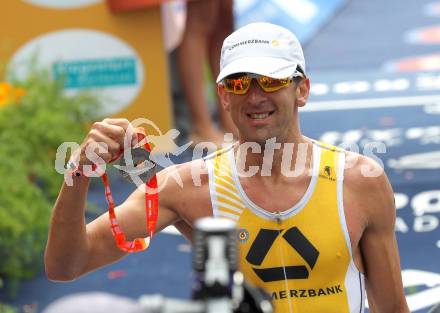 Ironman Austria.  Laufen. Neuer Weltrekord. Marino Vanhoenacker (BEL). . KLagenfurt, am 3.7.2011.
Foto: Kuess

---
pressefotos, pressefotografie, kuess, qs, qspictures, sport, bild, bilder, bilddatenbank