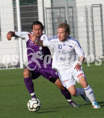 Fussball Testspiel. SK Austria Klagenfurt gegen Treibach. Almedin Hota (Austria Klagenfurt), Alexander Lessnigg (Treibach). KLagenfurt, am 8.7.2011.
Foto: Kuess 
---
pressefotos, pressefotografie, kuess, qs, qspictures, sport, bild, bilder, bilddatenbank