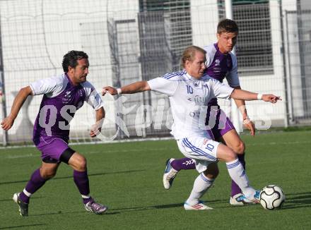 Fussball Testspiel. SK Austria Klagenfurt gegen Treibach. Almedin Hota(Austria Klagenfurt), Alexander Lessnigg (Treibach). KLagenfurt, am 8.7.2011.
Foto: Kuess 
---
pressefotos, pressefotografie, kuess, qs, qspictures, sport, bild, bilder, bilddatenbank