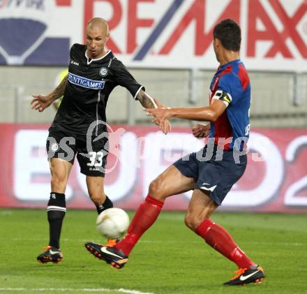 Fussball. UEFA Champions League. SK Sturm Graz gegen Videoton. Patrick Wolf, (Graz),  Zoltan Liptak (Videoton). Klagenfurt, am 13.7.2011.
Foto: Kuess

---
pressefotos, pressefotografie, kuess, qs, qspictures, sport, bild, bilder, bilddatenbank