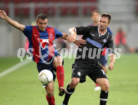 Fussball. UEFA Champions League. SK Sturm Graz gegen Videoton. Samir Muratovic,  (Graz), Nikola Mitrovic (Videoton). Klagenfurt, am 13.7.2011.
Foto: Kuess

---
pressefotos, pressefotografie, kuess, qs, qspictures, sport, bild, bilder, bilddatenbank