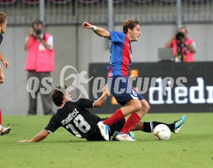 Fussball. UEFA Champions League. SK Sturm Graz gegen Videoton. Joachim Standfest, (Graz), Dusan Vasiljevic (Videoton). Klagenfurt, am 13.7.2011.
Foto: Kuess

---
pressefotos, pressefotografie, kuess, qs, qspictures, sport, bild, bilder, bilddatenbank