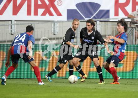 Fussball. UEFA Champions League. SK Sturm Graz gegen Videoton. Imre Szabics, (Graz), Hector Sanchez (Videoton. Klagenfurt, am 13.7.2011.
Foto: Kuess

---
pressefotos, pressefotografie, kuess, qs, qspictures, sport, bild, bilder, bilddatenbank