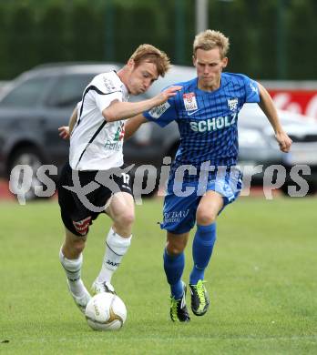 Fussball. Erste Liga. WAC/St. Andrae gegen SV Groedig. Mathias Berchtold, (WAC), Thomas Salamon (Groedig). Wolfsberg, 15.7.2011. 
Foto: Kuess

---
pressefotos, pressefotografie, kuess, qs, qspictures, sport, bild, bilder, bilddatenbank