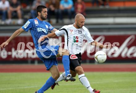 Fussball. Erste Liga. WAC/St. Andrae gegen SV Groedig. Stephan Mathias Stueckler, (WAC),  Jimenez Cabrera Ione Agoney (Groedig). Wolfsberg, 15.7.2011. 
Foto: Kuess

---
pressefotos, pressefotografie, kuess, qs, qspictures, sport, bild, bilder, bilddatenbank