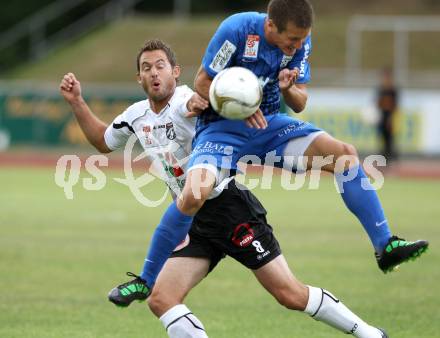 Fussball. Erste Liga. WAC/St. Andrae gegen SV Groedig. Gernot Messner, (WAC),  Joachim Parapatits (Groedig). Wolfsberg, 15.7.2011. 
Foto: Kuess

---
pressefotos, pressefotografie, kuess, qs, qspictures, sport, bild, bilder, bilddatenbank