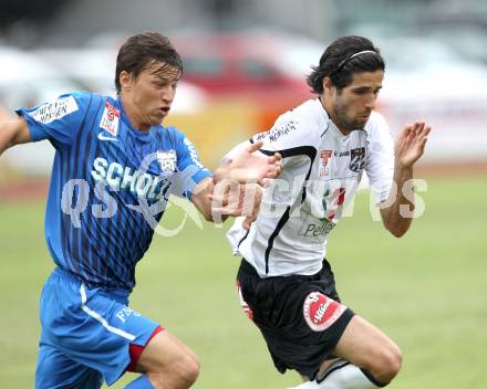 Fussball. Erste Liga. WAC/St. Andrae gegen SV Groedig. Jacobo,  (WAC), Stefan Lainer (Groedig). Wolfsberg, 15.7.2011. 
Foto: Kuess

---
pressefotos, pressefotografie, kuess, qs, qspictures, sport, bild, bilder, bilddatenbank