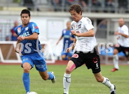 Fussball. Erste Liga. WAC/St. Andrae gegen SV Groedig. Christian Falk,  (WAC), Jimenez Aranciba Ricardo (Groedig). Wolfsberg, 15.7.2011. 
Foto: Kuess

---
pressefotos, pressefotografie, kuess, qs, qspictures, sport, bild, bilder, bilddatenbank