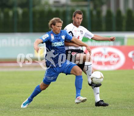 Fussball. Erste Liga. WAC/St. Andrae gegen SV Groedig. Gernot Messner, (WAC), Sebastian Siller (Groedig). Wolfsberg, 15.7.2011. 
Foto: Kuess

---
pressefotos, pressefotografie, kuess, qs, qspictures, sport, bild, bilder, bilddatenbank