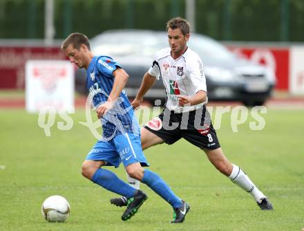 Fussball. Erste Liga. WAC/St. Andrae gegen SV Groedig. Gernot Messner,  (WAC), Joachim Parapatits (Groedig). Wolfsberg, 15.7.2011. 
Foto: Kuess

---
pressefotos, pressefotografie, kuess, qs, qspictures, sport, bild, bilder, bilddatenbank