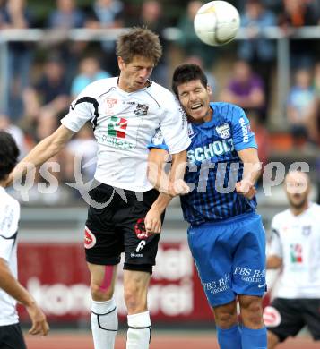 Fussball. Erste Liga. WAC/St. Andrae gegen SV Groedig. Christian Falk, (WAC), Jimenez Aranciba Ricardo (Groedig). Wolfsberg, 15.7.2011. 
Foto: Kuess

---
pressefotos, pressefotografie, kuess, qs, qspictures, sport, bild, bilder, bilddatenbank