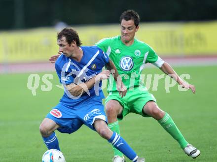 Fussball Testspiel. VSV gegen Vfl Wolfsburg.  Rok Pavlicic, (VSV), Marcel Schaefer (Wolfsburg). Villach, 17.7.2011
Foto: Kuess

---
pressefotos, pressefotografie, kuess, qs, qspictures, sport, bild, bilder, bilddatenbank